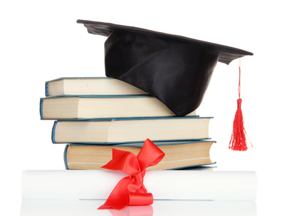 Grad hat with diploma and books isolated on white