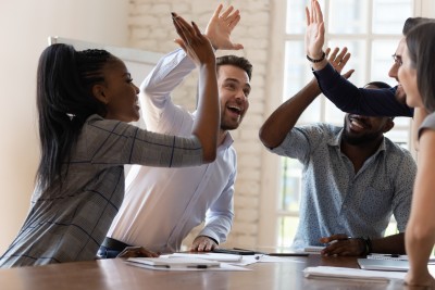 Multiracial,Euphoric,Business,Team,People,Give,High,Five,At,Office